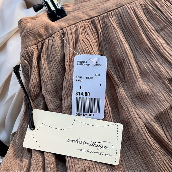 MOVING SALE! Forever 21 tan mini skirt - Picture 3 of 4